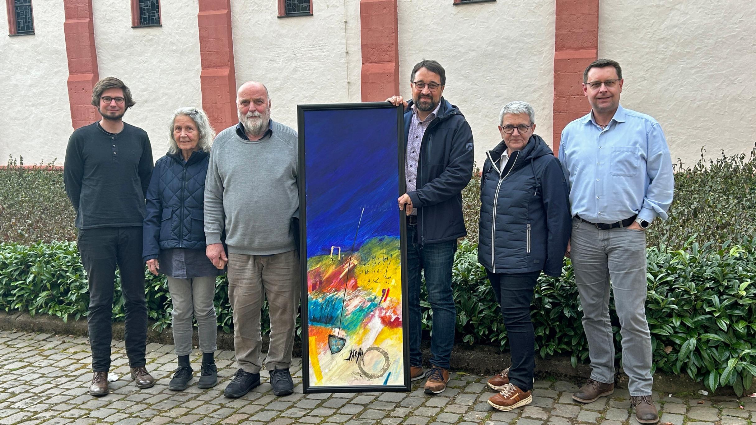 Philipp Kirsch (Leitungsteam), Marliese und Uwe Appold, Kooperator Michael Meyer, Marliese Klees und Gemeindereferent Thomas Kaspar bereiten den Ausstellungszyklus vor.